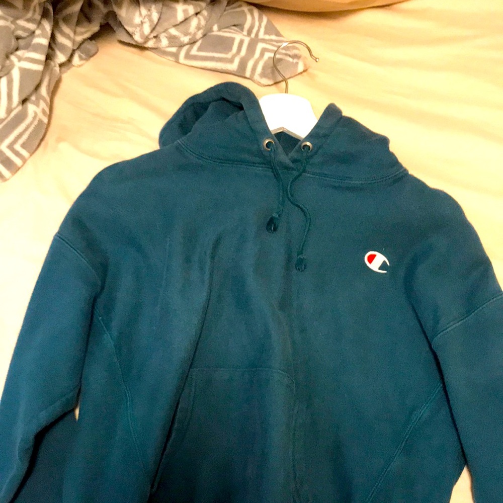 Woman’s champion turquoise hoodie. Size M barely worn